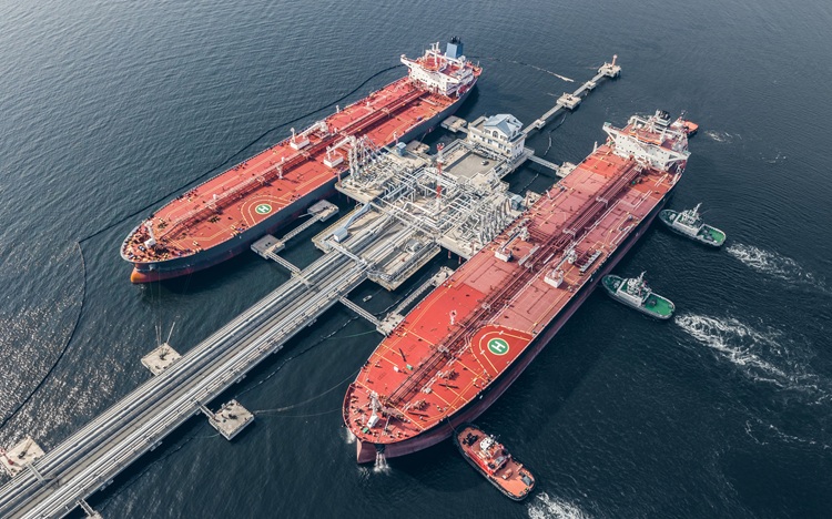 Oil tankers at sea representing global energy supply shocks and inflationary pressure